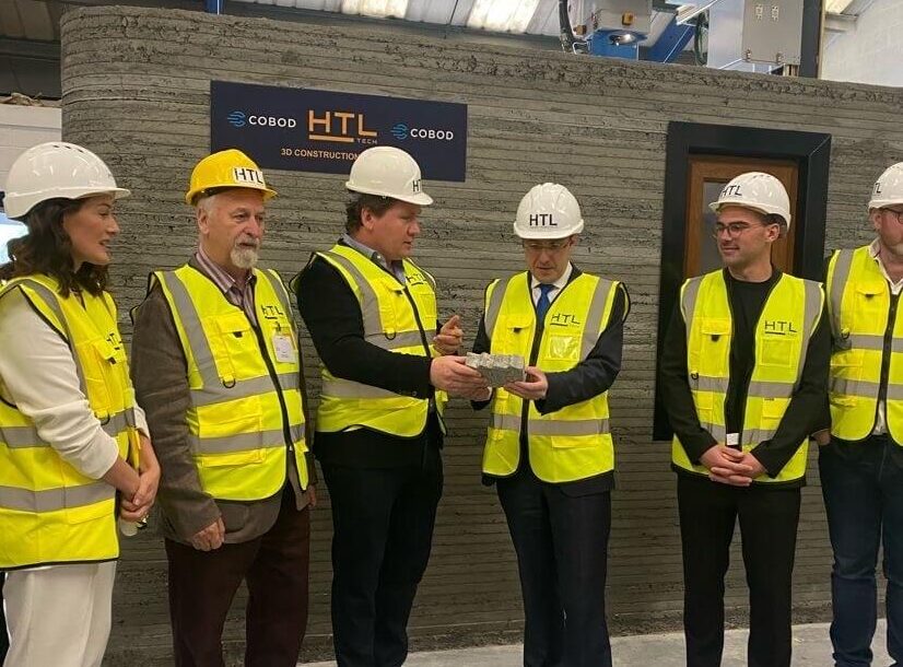 Group of people in High Vis in Harcourt Technology .