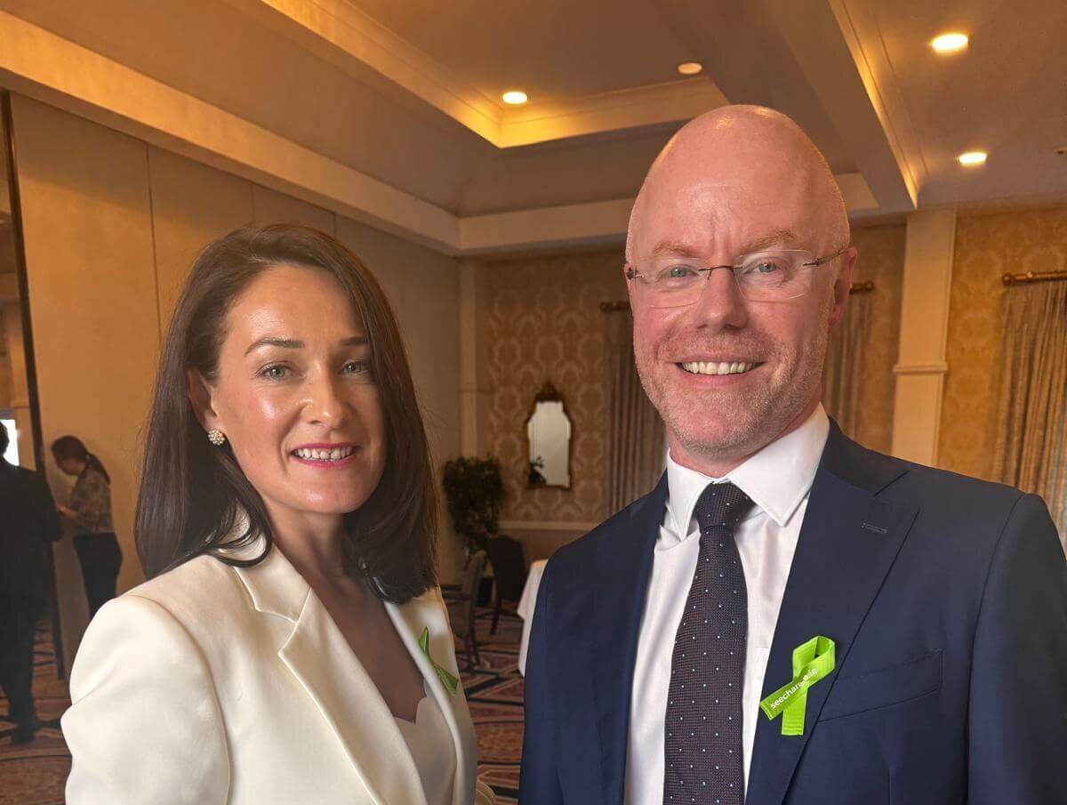 Photo of Senator Erin McGreehan and Minister Stephen Donnelly. Erin is wearing a cream blazer suit and Stephen is wearing a navy blazer, white shirt and purple tie.