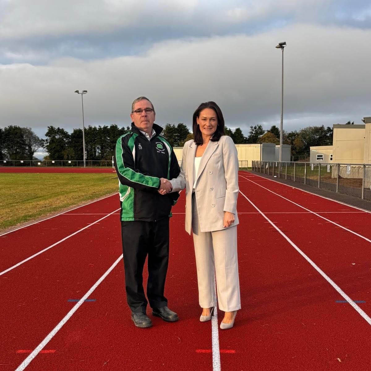 McGreehan congratulates Glenmore AC on being awarded the Development Club of the Year by Athletics Ireland